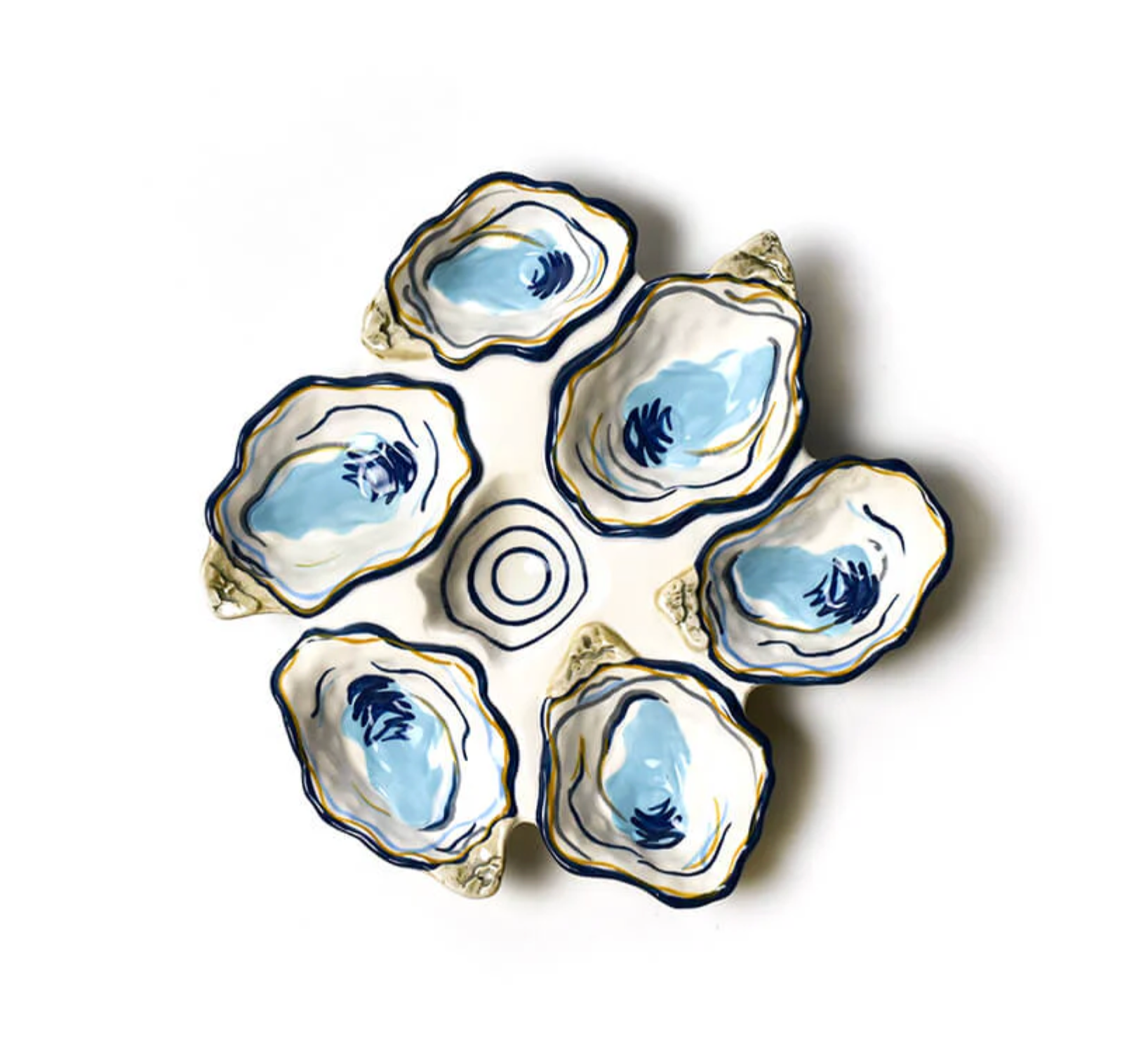A ceramic platter with oyster-shaped compartments in shades of blue, white, and gold. Available at Be Charmed