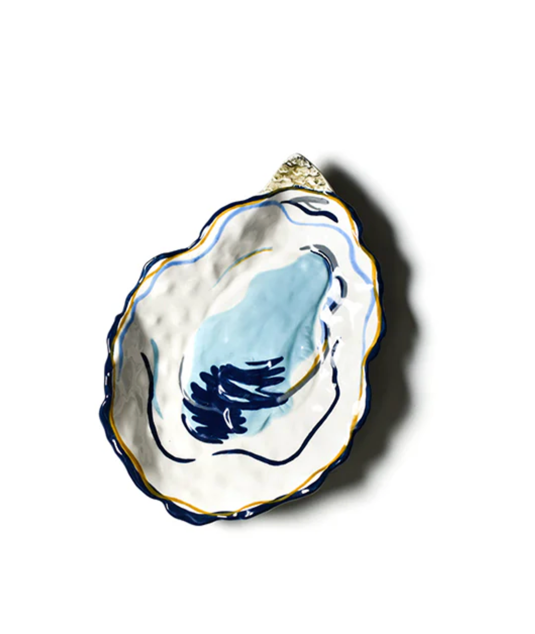 Hand‑painted Coton Colors oyster‑shaped ceramic plate with blue shell interior, gold accents, ideal for seafood or décor – Available at Be Charmed