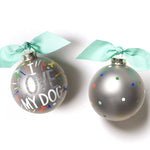 Coton Colors “I Love My Dog” oversized silver popper glass ornament with hand‑painted paw prints and silver glitter accent, includes swirled metal stand – Available at Be Charmed