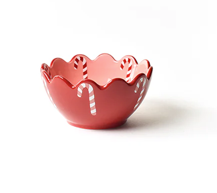 Red ceramic bowl with candy cane design on a white background. Available at Be Charmed. 