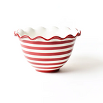 Coton Colors red and white striped bowl with wavy edge on a white background. Available at Be Charmed. 