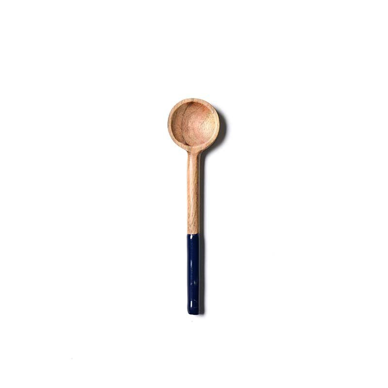 Wooden spoon with a dark handle on a white background. Available at Be Charmed