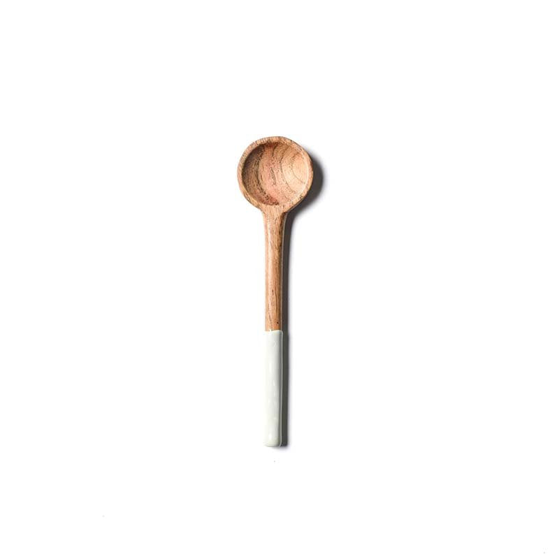 Wooden spoon with a white handle on a white background. Available at Be Charmed