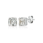 Pair of CZ stud earrings on a white background. Available at Be Charmed