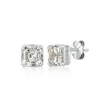 Pair of CZ stud earrings on a white background. Available at Be Charmed