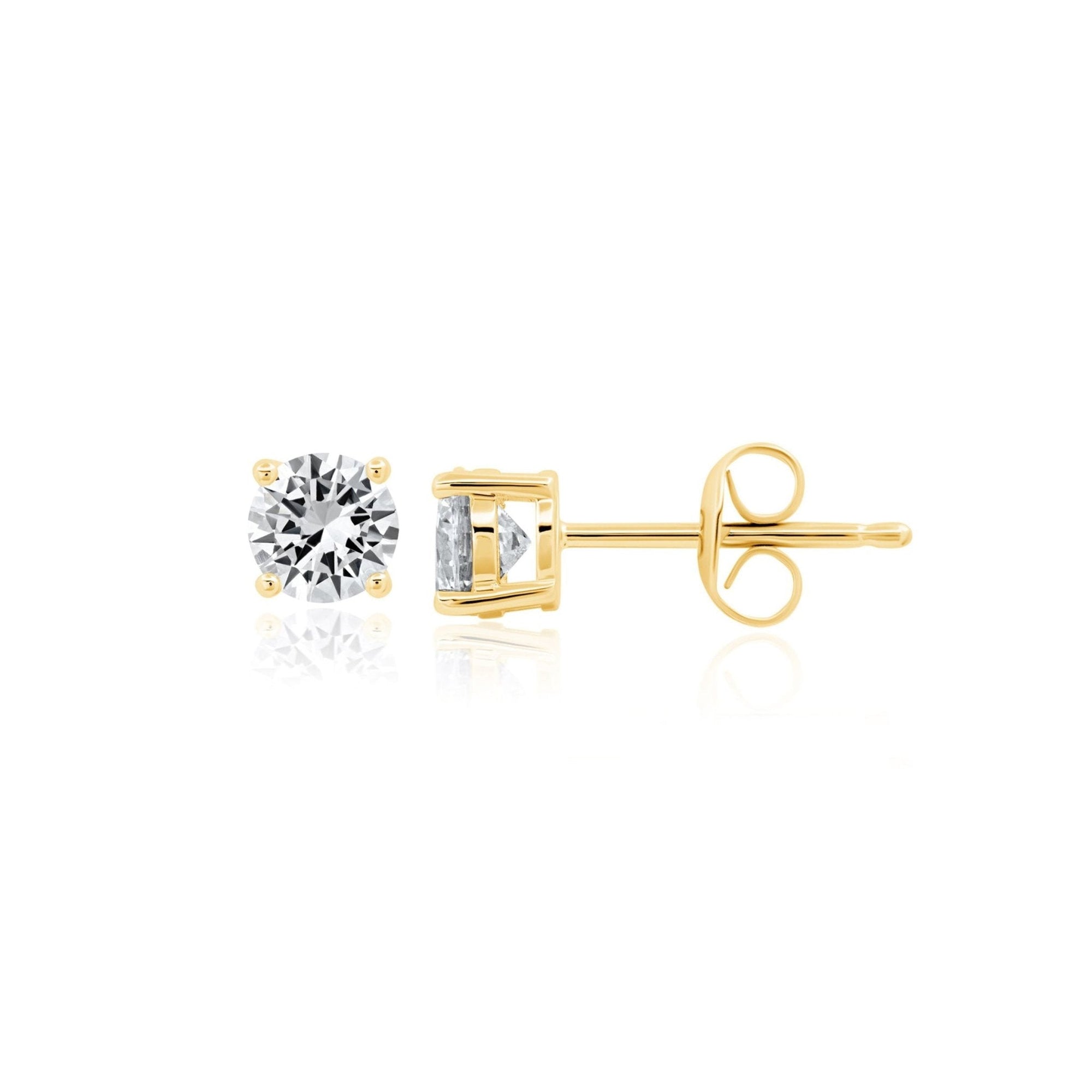 Gold stud earrings with CZ on a white background. Available at Be Charmed