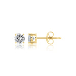 Gold stud earrings with CZ on a white background. Available at Be Charmed