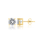 Gold stud earrings with CZ on a white background. Available at Be Charmed
