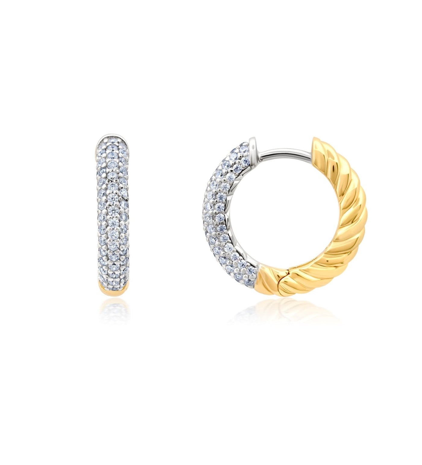 Two tone hoop earrings on a white background. Available at Be Charmed