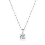 Silver necklace with a square-cut pendant on a white background. Available at Be Charmed