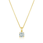 Gold necklace with a CZ pendant on a white background. Available at Be Charmed