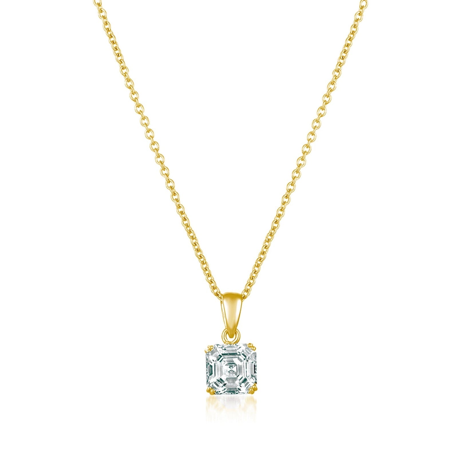 Gold necklace with a CZ pendant on a white background. Available at Be Charmed