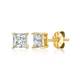 Gold stud earrings with clear gemstones on a white background. Available at Be Charmed