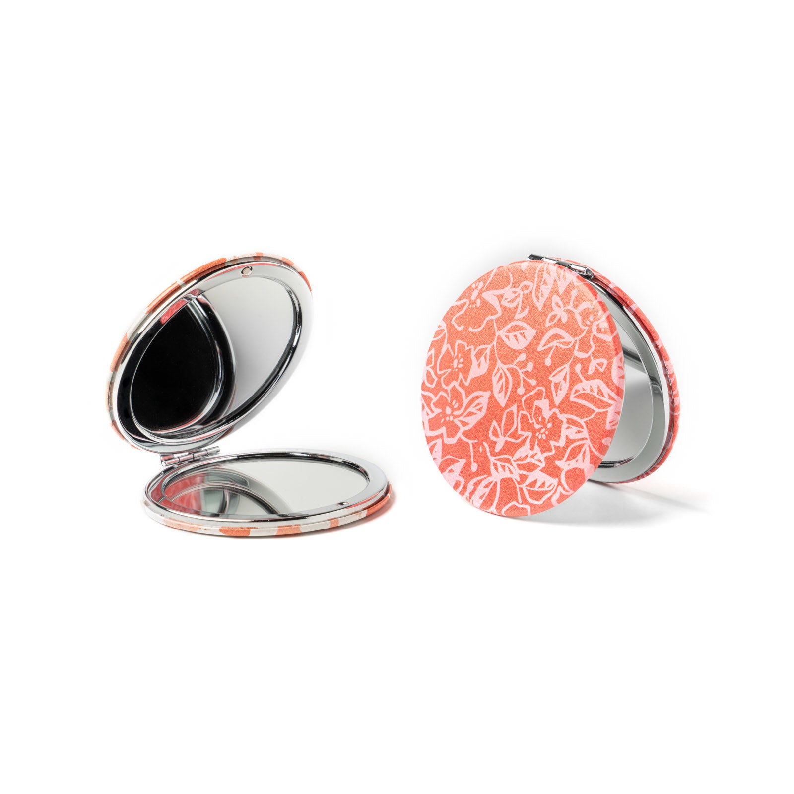 Opened Crush compact mirror with LED touch lighting and double-sided magnification for makeup touch-ups—Available at Be Charmed