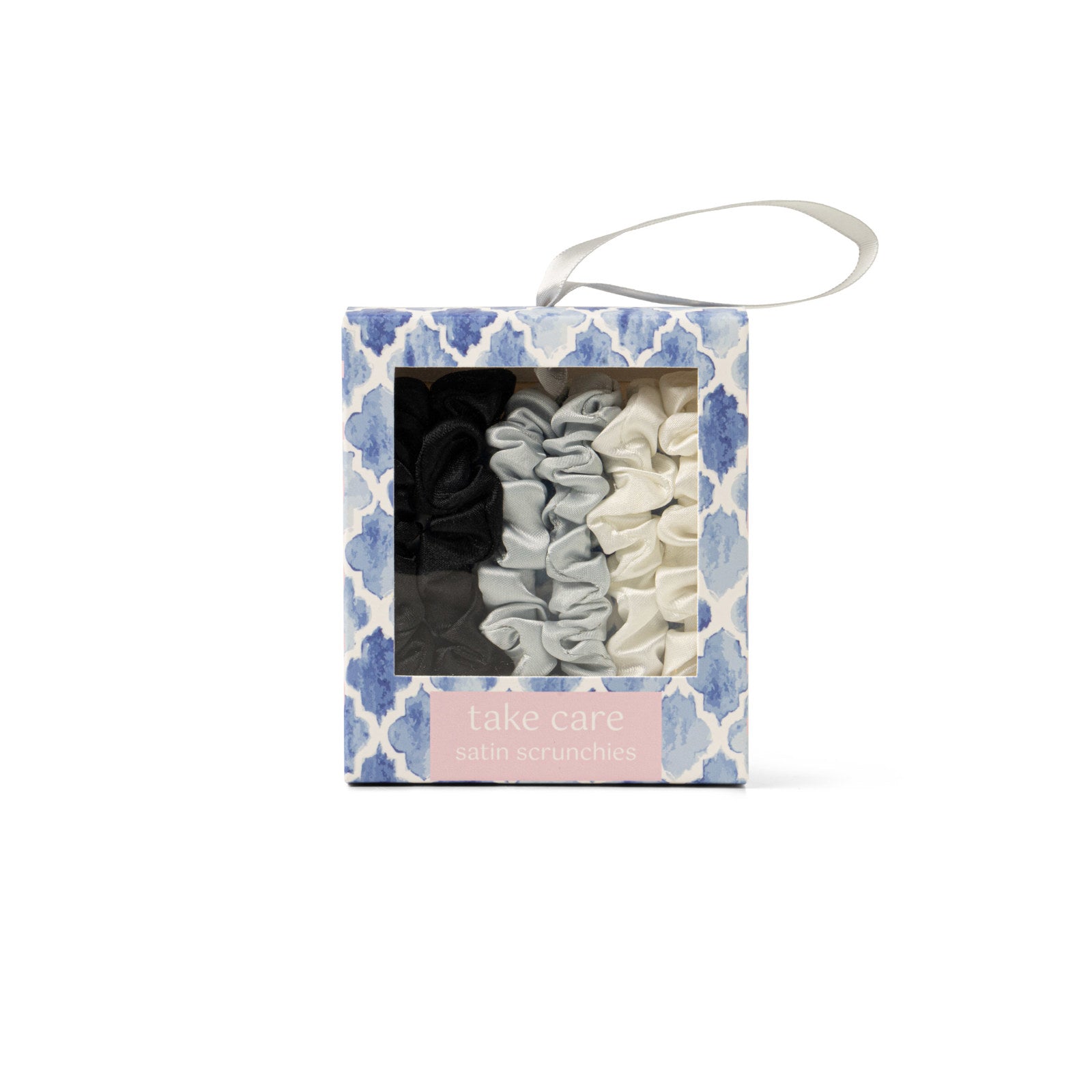 Set of scrunchies in a decorative box with floral pattern. Available at Be Charmed
