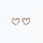 Cuties AB crystal heart stud earrings featuring iridescent Aurora Borealis crystals set on gold-tone hypoallergenic posts. Sparkling and elegant. Available at Be Charmed