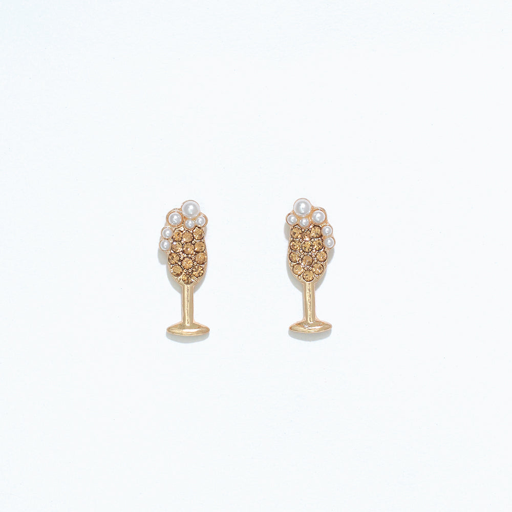 A pair of gold-colored hypoallergenic stainless steel post earrings featuring champagne pearls. Available at Be Charmed