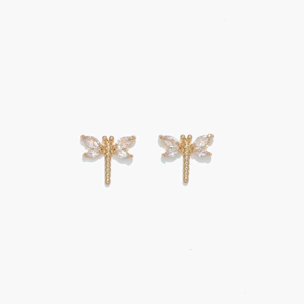 Cuties crystal dragonfly stud earrings — delicate dragonfly motif adorned with shimmering crystals on gold‑tone posts. Whimsical, hypoallergenic, lightweight. Available at Be Charmed