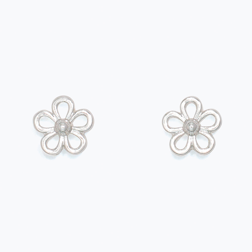 Pair of silver flower-shaped earrings on a white background. Available at Be Charmed