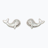Pair of silver whale-shaped earrings on a white background. Available at Be Charmed