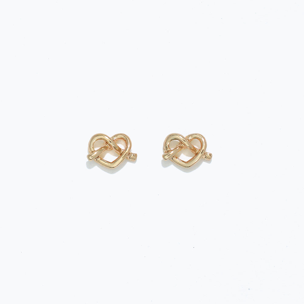 Gold Cuties Pretzel Heart Earrings with glossy gold heart‑twist design and hypoallergenic stainless‑steel posts—Available at Be Charmed