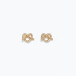 Gold Cuties Pretzel Heart Earrings with glossy gold heart‑twist design and hypoallergenic stainless‑steel posts—Available at Be Charmed