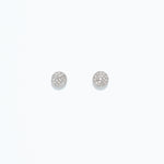 A pair of round earrings with a pave crystal design, presented against a white background. Available at Be Charmed
