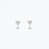 A pair of silver stud earrings in the shape of martini glasses, featuring a crystal design. Available at Be Charmed