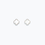 A pair of pearlized clover design earrings on a white background. Available at Be Charmed