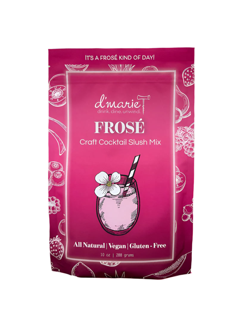 D'Marie Frosé Slush Mix pouch featuring fruity pink design—craft cocktail mix to combine with rosé wine and freeze. Light, refreshing, and easy. Available at Be Charmed
