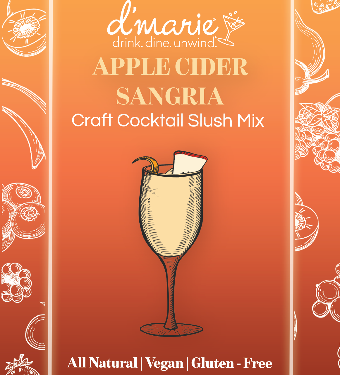 D'marie Apple Cider Sangria cocktail mix package on an orange background with illustrations of fruits and a glass. Available at Be Charmed