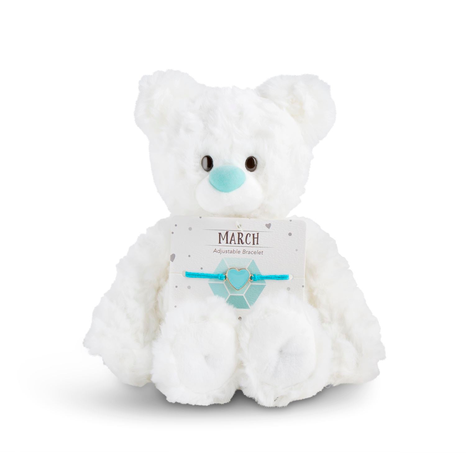 White plush bear with 'March' card with a heart bracelet on a white background. Available at Be Charmed