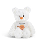 White plush bear with 'November' card with a heart bracelet on a white background. Available at Be Charmed