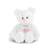 White plush bear with 'October' card with a heart bracelet on a white background. Available at Be Charmed