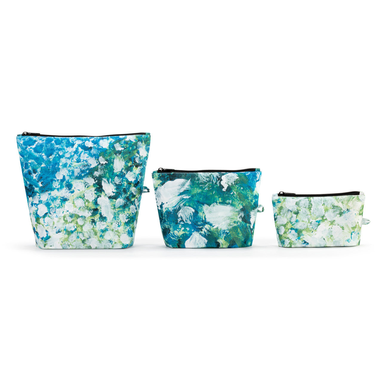 Demdaco ArtLifting pouch set in white flowers print on 3 sizes of durable polyester—Available at Be Charmed.
