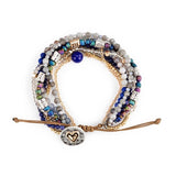 Multistrand beaded bracelet with heart charm on a white background.  Available at Be Charmed