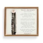 Demdaco Black Beaded Love Bracelet with heart charm and layered strands in box, available at Be Charmed.