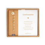 Demdaco Confirmation Bracelet In Box: adjustable gold-tone chain with white beads and cross charm—available at Be Charmed.