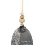 Ceramic Demdaco feather Mini Inspired Bell (~2″×2.5″) with hanging cord and wood bead—uplifting decor with inspirational message. Available at Be Charmed.