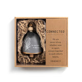 Ceramic Demdaco Feather Mini Inspired Bell (~2″×2.5″) pictured in box; with hanging cord and wood bead—uplifting decor with inspirational message. Available at Be Charmed.