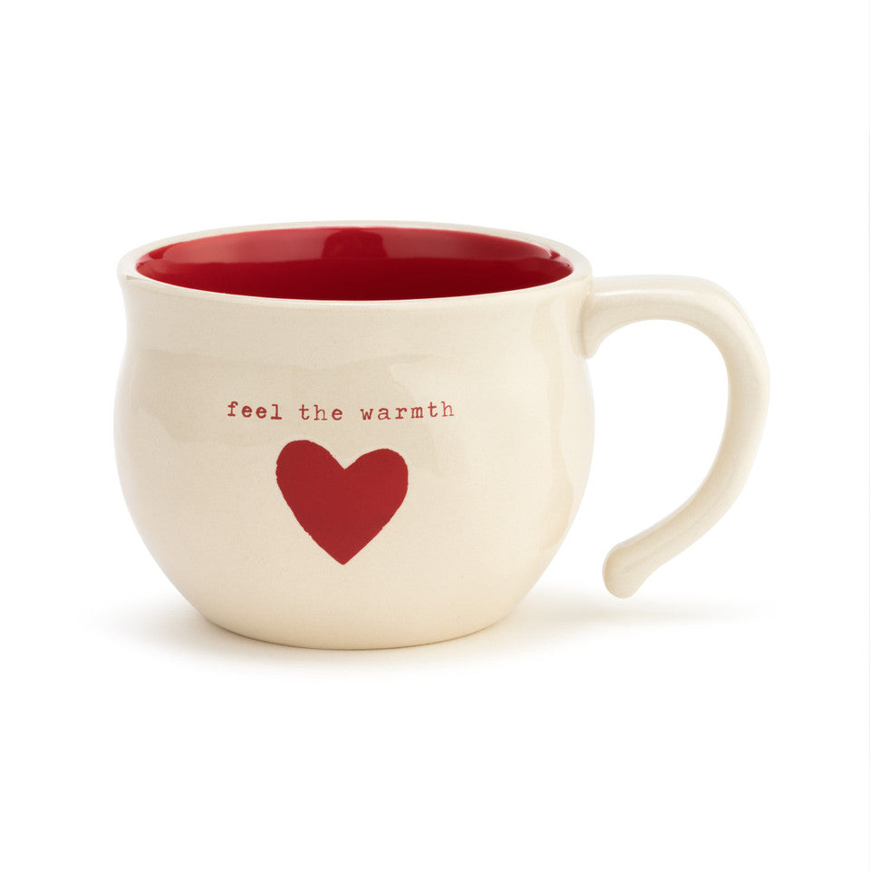 Demdaco 16 oz stoneware Feel the Warmth Heart Soup Bowl, 4.5″×3.5″ cream ceramic with heart motif and hand‑thrown feel—available at Be Charmed.