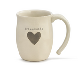 16 oz Demdaco Friendship Heart Mug in cream stoneware, microwave and dishwasher safe, available at Be Charmed.