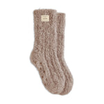 Pair of beige fuzzy socks on a white background. Available at Be Charmed