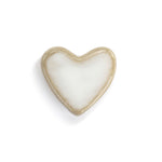 Heart-shaped token with gold rim on a white background. Available at Be Charmed