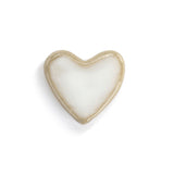 Heart-shaped token with gold rim on a white background. Available at Be Charmed