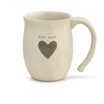 Demdaco Heart Mug – Cat Mom edition, 16 oz ceramic stoneware with heart design. Microwave & dishwasher safe. Available at Be Charmed