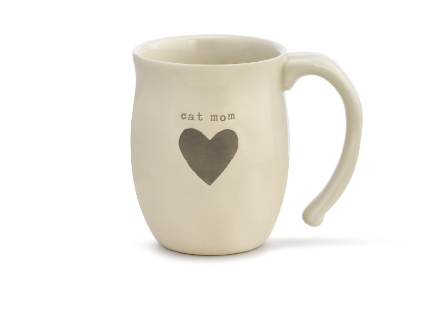 Demdaco Heart Mug – Cat Mom edition, 16 oz ceramic stoneware with heart design. Microwave & dishwasher safe. Available at Be Charmed