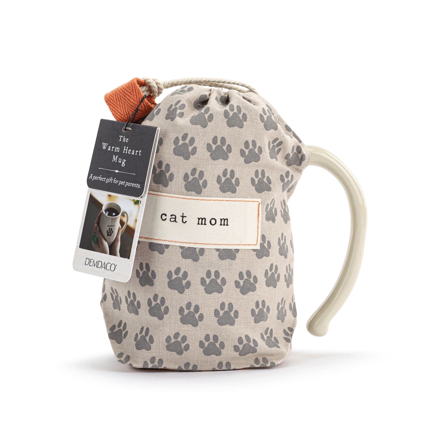 Mug with paw print pattern and 'cat mom' label, featuring a Demdaco tag on a white background. Available at Be Charmed
