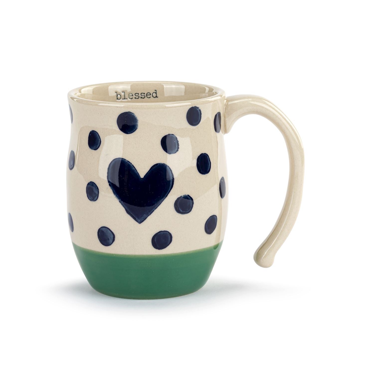 Ceramic mug with blue polka dots and a heart design on a white background. Available at Be Charmed