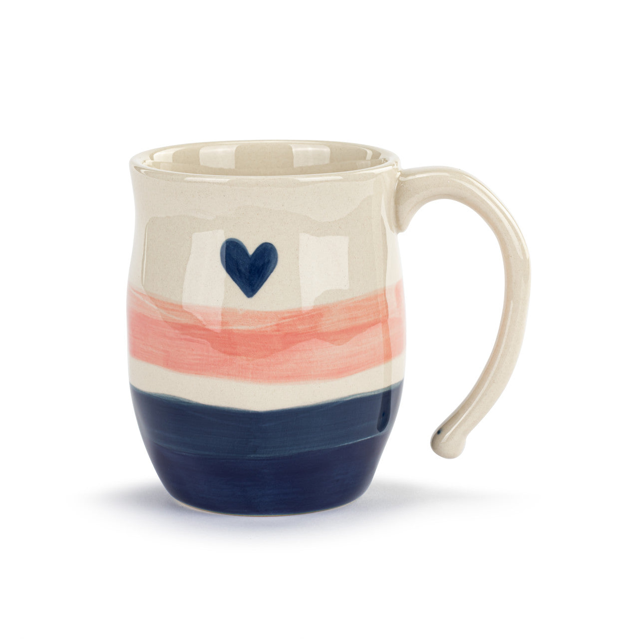 Ceramic mug with a heart design on a white background. Available at Be Charmed